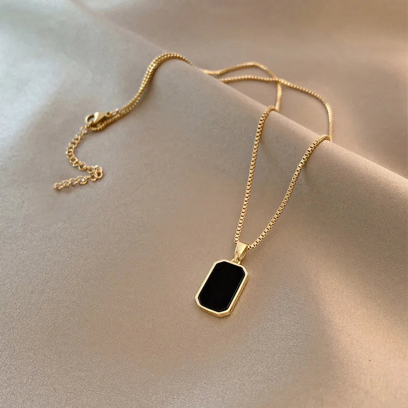 Korean-Inspired Black Geometric Pendant Necklace with Gold Chain for Women - Elegant Fashion Jewelry for Parties and Gifts