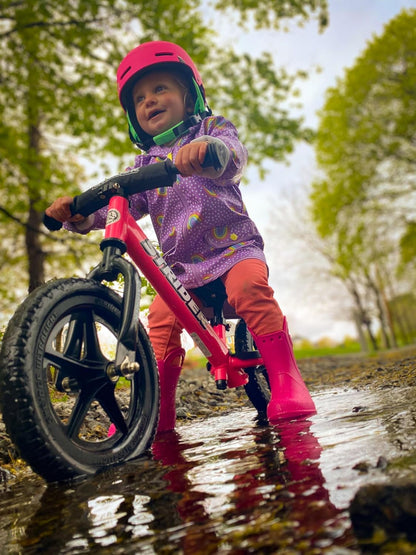 Strider 12” Sport Balance Bike for Children Aged 1 to 4 Years - Features Safety Pad, Padded Seat, Mini Grips, and Flat-Free Tires - Easy Tool-Free Assembly and Adjustments